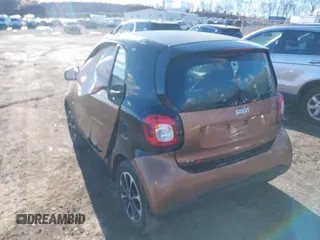 2016 Smart fortwo Passion with VIN WMEFJ5DA6GK079651, listed as a IAAI auction lot 41607293 with 146,753 mi miles and . Bid and sale history available at DreamBid. Image 3.