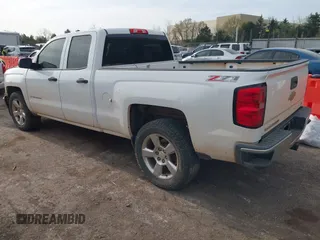 2014 Chevrolet Silverado 1500 LT with VIN 1GCVKREC8EZ108120, listed as a IAAI auction lot 41911695 with 217,358 mi miles. Bid and sale history available at carsss.com. Image 3.