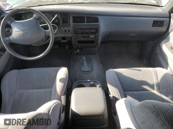 1997 Toyota T100 SR5 with VIN JT4UN24D8V0047084, listed as a Copart auction lot 82485654 with 181,596 mi miles and Salvage Title. Bid and sale history available at DreamBid. Image 8.
