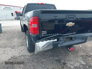 2011 Chevrolet Silverado 1500 LT with VIN 1GCRCSE0XBZ423010, listed as a IAAI auction lot 42112256 with 143,682 mi miles and . Bid and sale history available at DreamBid. Image 6.