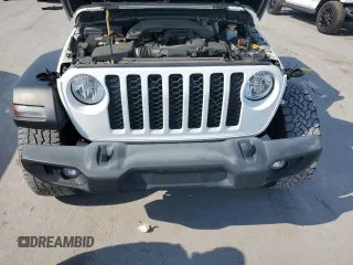 2020 Jeep Gladiator Sport S z VIN 1C6HJTAG8LL121995, wystawiony jako Copart lot #57208555 z przebiegiem 118 545 mil mil oraz Tytuł czysty. Historia ofert i sprzedaży dostępna na DreamBid. Obrazek 11.