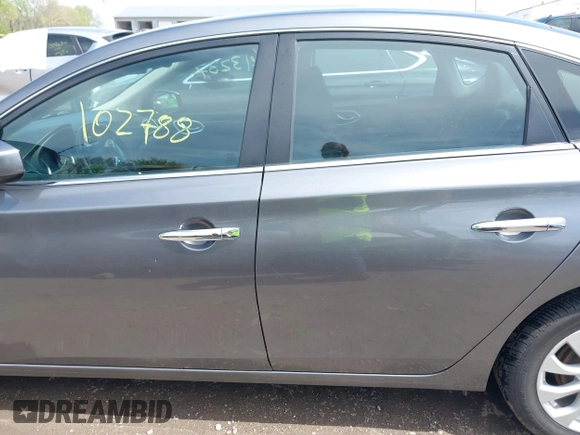 2019 Nissan Sentra S with VIN 3N1AB7AP3KY293231, listed as a IAAI auction lot 39213237 with 102,788 mi miles and . Bid and sale history available at DreamBid. Image 14.