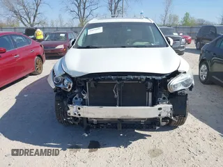 2015 Infiniti QX60 with VIN 5N1AL0MM6FC554039, listed as a IAAI auction lot 42055591 with 148,364 mi miles. Bid and sale history available at carsss.com. Image 6.