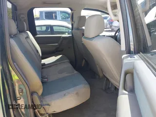 2007 Nissan Titan XE with VIN 1N6AA07A57N241515, listed as a IAAI auction lot 41950229 with 163,290 mi miles and . Bid and sale history available at DreamBid. Image 8.