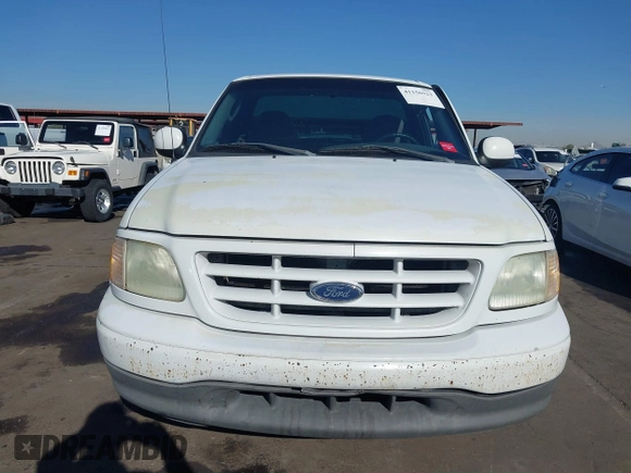 2003 Ford F-150 XL with VIN 1FTRF17293NA46808, listed as a IAAI auction lot 41156923 with 384,475 mi miles and . Bid and sale history available at DreamBid. Image 12.