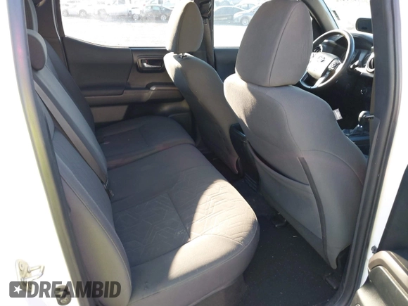 2018 Toyota Tacoma SR5 with VIN 3TMAZ5CN4JM062272, listed as a IAAI auction lot 41671472 with 114,566 mi miles and . Bid and sale history available at DreamBid. Image 8.