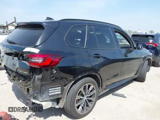 2021 BMW X5 xDrive40i with VIN 5UXCR6C01M9E66976, listed as a IAAI auction lot 42024110 with 67,877 mi miles and . Bid and sale history available at DreamBid. Image 4.