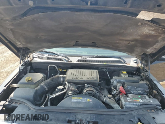 2007 Jeep Commander Limited z VIN 1J8HG58P27C520330, wystawiony jako Copart lot #54595745 z przebiegiem 168 908 mil mil oraz Szkoda całkowita • Salvage title. Historia ofert i sprzedaży dostępna na DreamBid. Obrazek 12.