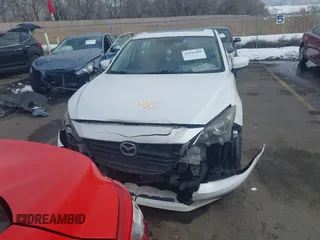 2014 Mazda 3 i Grand Touring with VIN JM1BM1W71E1209014, listed as a IAAI auction lot 41636308 with 218,277 mi miles and . Bid and sale history available at carsss.com. Image 12.