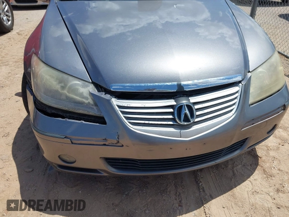 2005 Acura RL z VIN JH4KB16575C011822, wystawiony jako IAAI lot #42434095 z przebiegiem Nie podano mil oraz . Historia ofert i sprzedaży dostępna na DreamBid. Obrazek 6.