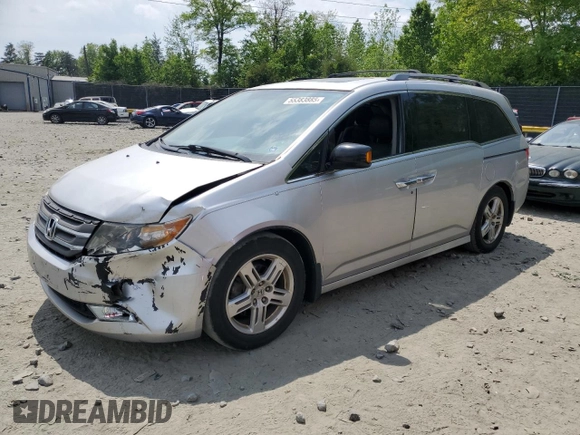 2012 Honda Odyssey Touring with VIN 5FNRL5H93CB121366, listed as a Copart auction lot 55383885 with 197,885 mi miles and Salvage title. Bid and sale history available at DreamBid. Image 1.