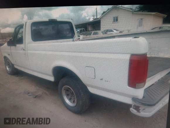 1995 Ford F-150 with VIN 1FTEF15Y9SLB91041, listed as a IAAI auction lot 38323569 with Not provided miles and . Bid and sale history available at DreamBid. Image 3.