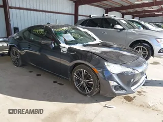 2015 Scion FR-S z VIN JF1ZNAA10F8707315, wystawiony jako IAAI lot #41326650 z przebiegiem 84 430 mil mil oraz . Historia ofert i sprzedaży dostępna na DreamBid. Obrazek 1.