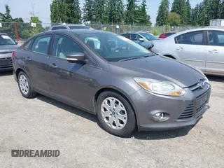 2012 Ford Focus SE z VIN 1FAHP3F25CL260962, wystawiony jako IAAI lot #42588485 z przebiegiem 143 679 mil mil oraz . Historia ofert i sprzedaży dostępna na DreamBid. Obrazek 1.