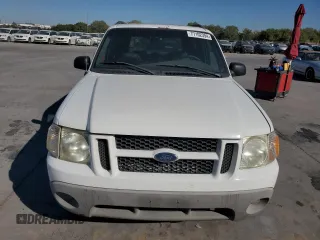 2001 Ford Explorer Sport z VIN 1FMYU60E01UC72303, wystawiony jako Copart lot #77102394 z przebiegiem 184 821 mil mil oraz Tytuł czysty. Historia ofert i sprzedaży dostępna na DreamBid. Obrazek 5.