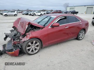 2016 Cadillac ATS Standard AWD z VIN 1G6AG5RX5G0101805, wystawiony jako Copart lot #82416594 z przebiegiem Nie podano mil oraz Szkoda całkowita • Salvage title. Historia ofert i sprzedaży dostępna na DreamBid. Obrazek 1.