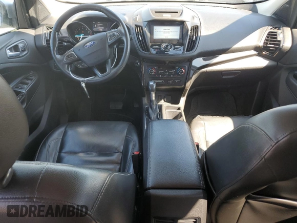 2017 Ford Escape Titanium with VIN 1FMCU0J90HUB04082, listed as a Copart auction lot 77814994 with 135,674 mi miles and Salvage Title. Bid and sale history available at carsss.com. Image 8.