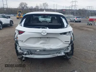2020 Mazda CX-5 Grand Touring with VIN JM3KFBDM5L0731373, listed as a IAAI auction lot 41900567 with 31,268 mi miles and . Bid and sale history available at DreamBid. Image 16.