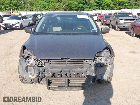 2012 Ford Focus SE with VIN 1FAHP3K28CL308346, listed as a IAAI auction lot 42034073 with 182,387 mi miles and . Bid and sale history available at carsss.com. Image 6.