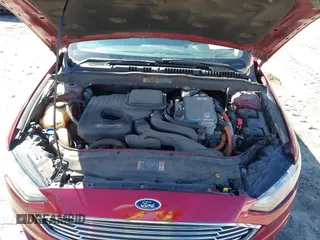 2018 Ford Fusion Hybrid SE with VIN 3FA6P0LU1JR243022, listed as a IAAI auction lot 41470052 with 119,636 mi miles. Bid and sale history available at carsss.com. Image 10.