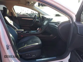 2016 Ford Fusion Titanium Hybrid with VIN 3FA6P0RU1GR259947, listed as a IAAI auction lot 41695377 with 97,605 mi miles. Bid and sale history available at carsss.com. Image 5.