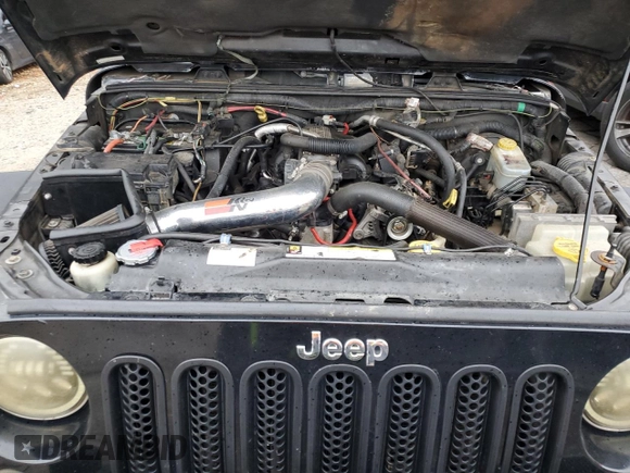 2008 Jeep Wrangler Unlimited Sahara with VIN 1J4GA59168L580525, listed as a Copart auction lot 47147905 with 223,138 mi miles and Salvage Title. Bid and sale history available at carsss.com. Image 12.