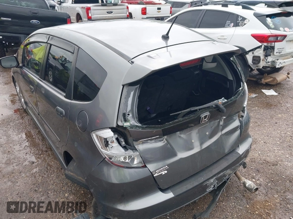2011 Honda Fit Sport z VIN JHMGE8H51BC003715, wystawiony jako IAAI lot #42108476 z przebiegiem 174 228 mil mil oraz . Historia ofert i sprzedaży dostępna na DreamBid. Obrazek 6.
