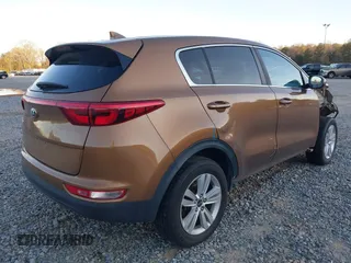 2019 Kia Sportage LX with VIN KNDPM3AC8K7598121, listed as a IAAI auction lot 41805939 with 119,050 mi miles and . Bid and sale history available at carsss.com. Image 4.