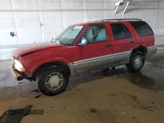1998 GMC Jimmy SLT with VIN 1GKDT13W3W2521651, listed as a Copart auction lot 46492945 with 240,384 mi miles and Clean Title. Bid and sale history available at carsss.com. Image 1.