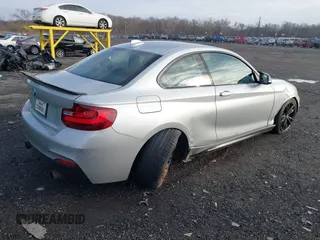 2016 BMW 2 Series M235i with VIN WBA1J7C54GV359301, listed as a IAAI auction lot 41186271 with 97,671 mi miles. Bid and sale history available at carsss.com. Image 4.
