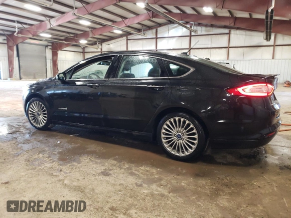2014 Ford Fusion Titanium Hybrid z VIN 3FA6P0RUXER168706, wystawiony jako Copart lot #55362295 z przebiegiem 136 382 mil mil oraz Czysty tytuł • Clean title. Historia ofert i sprzedaży dostępna na DreamBid. Obrazek 2.