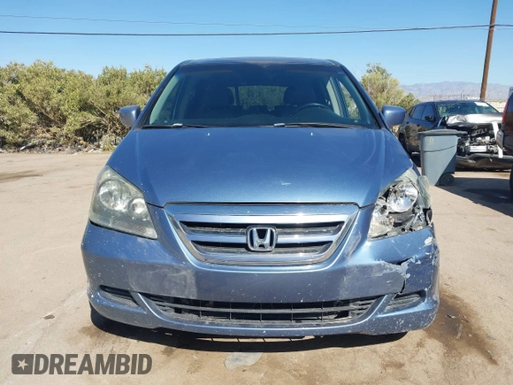 2006 Honda Odyssey EX-L with VIN 5FNRL38796B099851, listed as a IAAI auction lot 41555109 with 154,707 mi miles and . Bid and sale history available at DreamBid. Image 13.