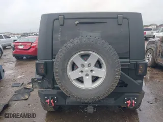 2010 Jeep Wrangler Unlimited Sport with VIN 1J4BA3H16AL163816, listed as a IAAI auction lot 41556866 with 160,224 mi miles. Bid and sale history available at carsss.com. Image 16.