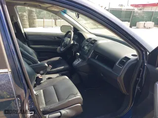 2007 Honda CR-V EX-L with VIN 5J6RE48757L017641, listed as a IAAI auction lot 42039082 with 213,859 mi miles. Bid and sale history available at carsss.com. Image 5.