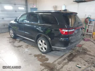 2014 Dodge Durango Limited with VIN 1C4RDJDG1EC973130, listed as a IAAI auction lot 41846596 with 166,182 mi miles. Bid and sale history available at carsss.com. Image 3.