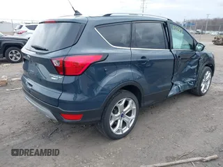 2019 Ford Escape Titanium with VIN 1FMCU9J95KUC28621, listed as a IAAI auction lot 41825297 with 60,373 mi miles. Bid and sale history available at carsss.com. Image 4.
