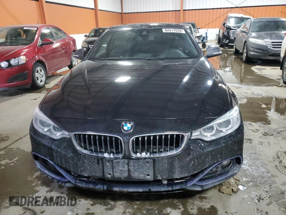 2016 BMW 4 Series 428i xDrive with VIN WBA3N9C50GK250277, listed as a Copart auction lot 82617034 with 138,461 mi miles and Clean Title. Bid and sale history available at carsss.com. Image 5.