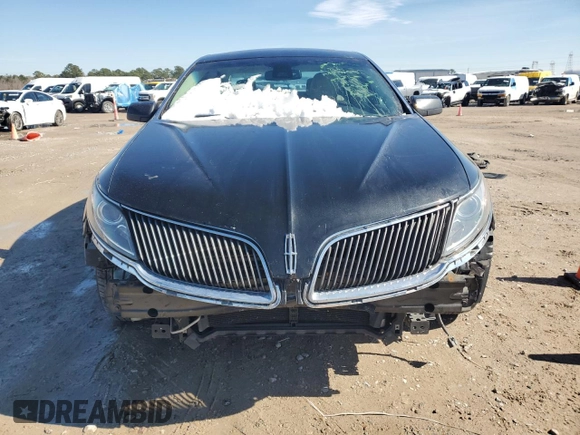 2014 Lincoln MKS z VIN 1LNHL9DK3EG606655, wystawiony jako Copart lot #42008655 z przebiegiem 100 886 mil mil oraz Szkoda całkowita • Salvage title. Historia ofert i sprzedaży dostępna na DreamBid. Obrazek 5.