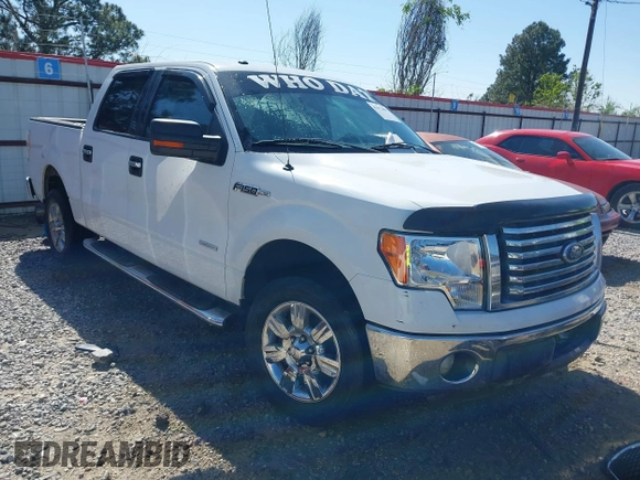 2012 Ford F-150 XL with VIN 1FTFW1CT8CFA09809, listed as a IAAI auction lot 41972801 with 164,245 mi miles. Bid and sale history available at carsss.com. Image 1.