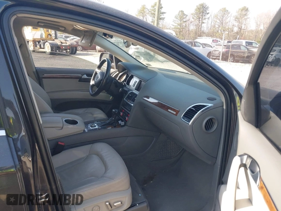 2014 Audi Q7 Premium Plus with VIN WA1LGAFE9ED001319, listed as a IAAI auction lot 41775171 with 144,711 mi miles and . Bid and sale history available at DreamBid. Image 5.