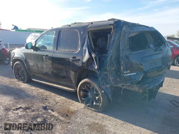 2014 GMC Yukon SLT with VIN 1GKS1CE00ER247249, listed as a IAAI auction lot 41271351 with 215,044 mi miles. Bid and sale history available at carsss.com. Image 3.