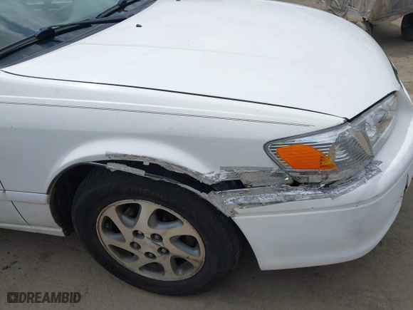 2000 Toyota Camry CE with VIN JT2BG22K3Y0406082, listed as a IAAI auction lot 42053116 with 171,219 mi miles. Bid and sale history available at carsss.com. Image 14.