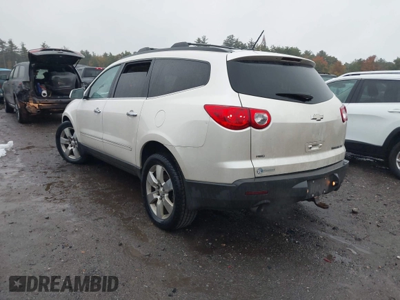 2011 Chevrolet Traverse LTZ with VIN 1GNKVLED5BJ385566, listed as a IAAI auction lot 40530314 with 166,155 mi miles and . Bid and sale history available at DreamBid. Image 3.