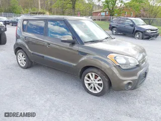 2012 Kia Soul + with VIN KNDJT2A63C7355735, listed as a IAAI auction lot 42041895 with 182,296 mi miles. Bid and sale history available at carsss.com. Image 1.