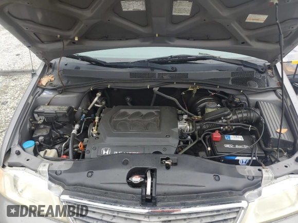 2000 Honda Odyssey EX with VIN 2HKRL1865YH513885, listed as a Copart auction lot 50223505 with 214,627 mi miles and Salvage Title. Bid and sale history available at DreamBid. Image 14.