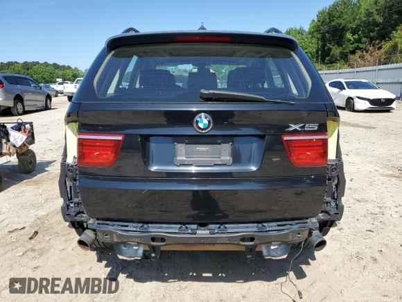 2012 BMW X5 35i z VIN 5UXZV4C52CL748838, wystawiony jako Copart lot #58051155 z przebiegiem 224 088 mil mil oraz Czysty tytuł • Clean title. Historia ofert i sprzedaży dostępna na DreamBid. Obrazek 6.