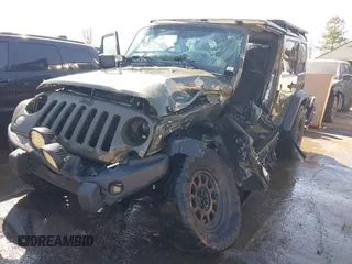 2015 Jeep Wrangler Unlimited Rubicon with VIN 1C4BJWFG0FL623431, listed as a IAAI auction lot 41651317 with 105,508 mi miles. Bid and sale history available at carsss.com. Image 2.