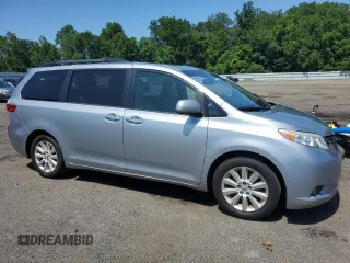 2015 Toyota Sienna Limited with VIN 5TDDK3DC4FS111836, listed as a Copart auction lot 61940595 with 111,579 mi miles and Salvage title. Bid and sale history available at DreamBid. Image 4.