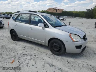 2009 Kia Rondo LX Base with VIN KNAFG528897229906, listed as a Copart auction lot 70821774 with 126,423 mi miles and Clean Title. Bid and sale history available at carsss.com. Image 4.