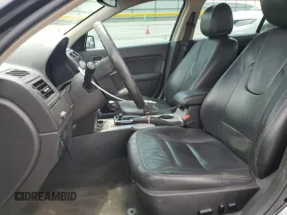 2012 Ford Fusion SEL with VIN 3FAHP0JA0CR386841, listed as a Copart auction lot 61587325 with 129,572 mi miles and Salvage title. Bid and sale history available at DreamBid. Image 7.